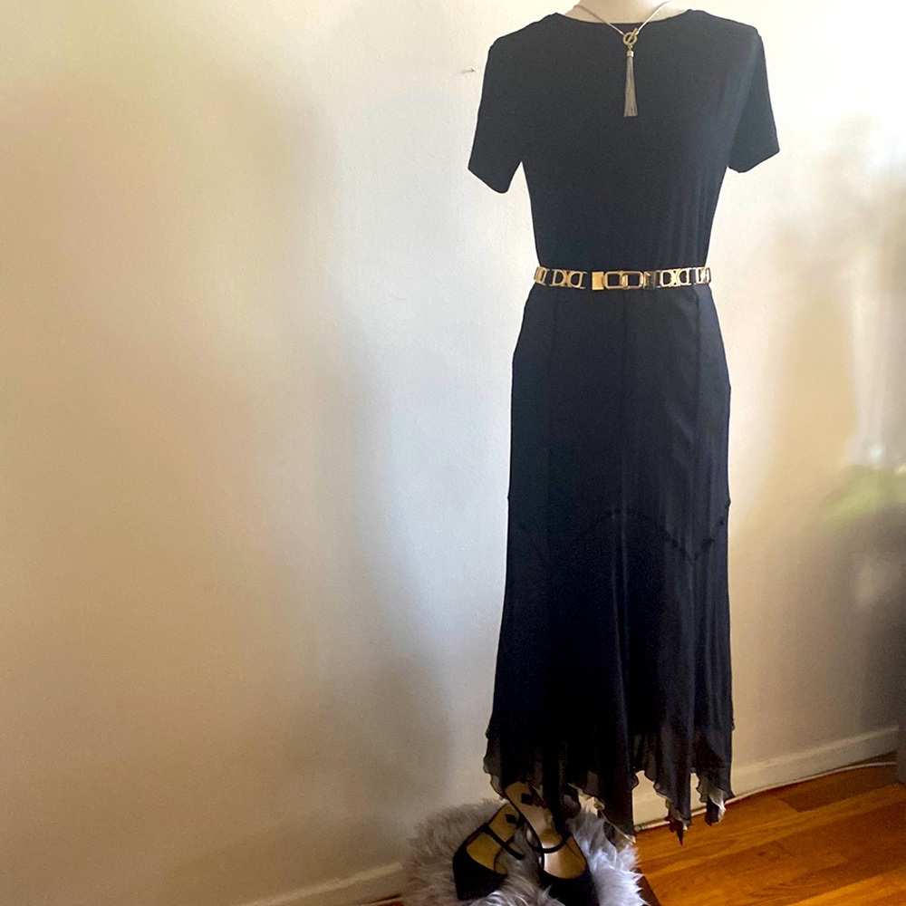 “Deni Clear” midi skirt in black/beige.